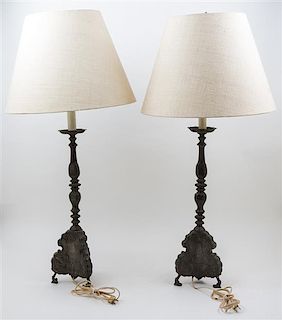 A Pair of Pewter Prickets Height overall 36 1/2 inches.