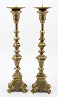 A Pair of Baroque Style Brass Pricket Sticks Height 24 inches.