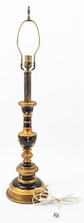 A Painted and Parcel Gilt Candlestick Height 34 inches.