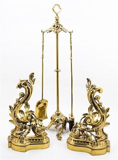 * A Louis XV Style Brass Fireplace Suite Height of stand 35 inches.