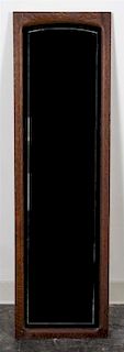 An Oak Framed Wall Mirror Height 48 1/2 inches.
