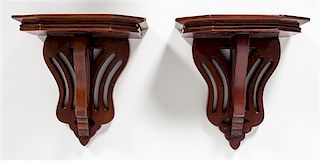 A Pair of Mahogany Wall Brackets Height 8 3/4 inches.