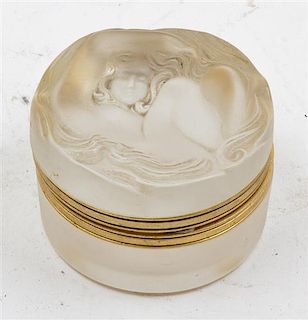 * A Lalique Glass Powder Box. Diameter 3 1/4 inches.