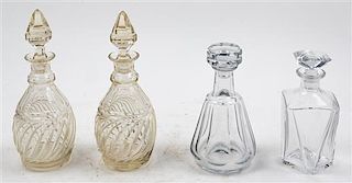 * Four Crystal Decanters Height of tallest 11 3/4 inches.