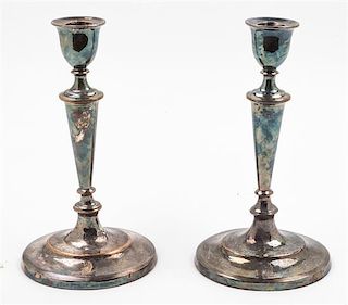 A Pair of Silver-Plate Candlesticks. Height 10 1/4 inches.