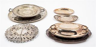 A Collection of Seven Silver-Plate Serving Articles Diameter of largest 16 inches.