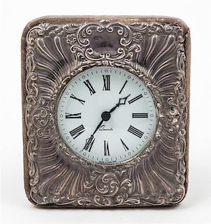 A Victorian Silver Picture Frame, , mounted as a desk clock.