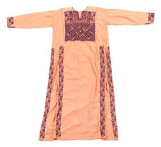 * A Palestinian Embroidered Dress Length of first 53 3/4 inches.