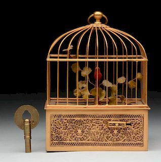 Bird in a Snuff Box in a Domed Cage.