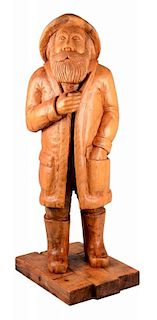 Carved Wooden Man with Pipe.