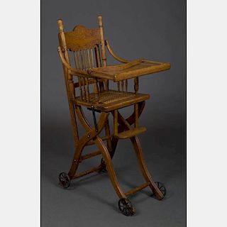 A Victorian Oak Transforming Doll's Rolling High Chair and Stroller, 19th Century.