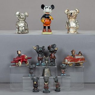 A Miscellaneous Collection of Cast Iron, Silver Plated and Rubber Mickey and Minnie Mouse Figures, 20th Century,
