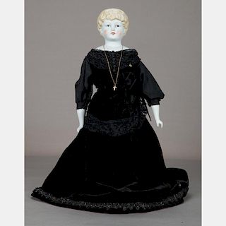 A German 22in. Bisque Head Doll, 20th Century,