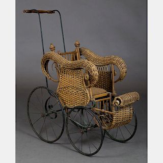 A Victorian Wicker and Metal Doll's Stroller, 19th/20th Century.