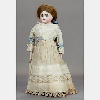 A German 16in. Bisque Head Doll, 20th Century,