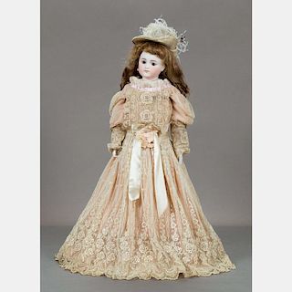 A German 27in. Bisque Head Doll, 20th Century,
