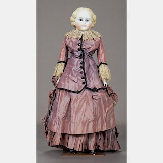 A German 20in. Bisque Head Shoulder Doll, 20th Century,