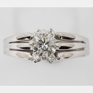 A 14kt White Gold and Diamond Engagement and Wedding Ring,