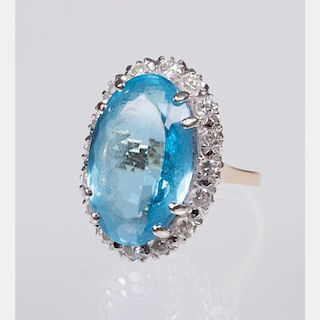 A 14kt. Yellow Gold, Blue Topaz and Diamond Ring,