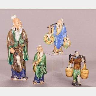 A Collection of Japanese Earthenware Figures, (Mud Men), 20th Century.