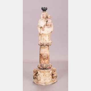 A Carved Alabaster Religious Figure Depicting the Madonna and Child, 20th Century.
