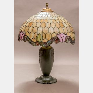 A Patinated Metal and Slag Glass Table Lamp, 20th Century,