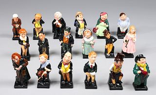 Group of Nineteen Royal Doulton Charles Dickens Figures and Book