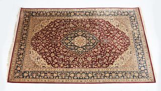 A Persian silk rug, second half 20th century