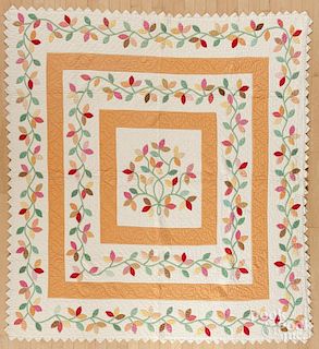 Pieced and appliqué vine and square quilt, early 20th c., 78'' x 72''.