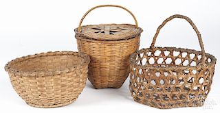 Three assorted woven baskets, likely Shaker, largest - 10 1/4'' h., 11'' dia.