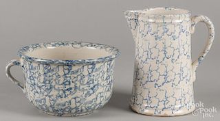 Blue spongeware, late 19th c., to include a pitcher, 9'' h., and a chamberpot, 5 1/4'' h.