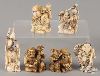 Six Japanese carved ivory netsukes.