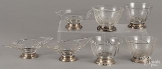 Seven sterling silver mounted glass bowls.