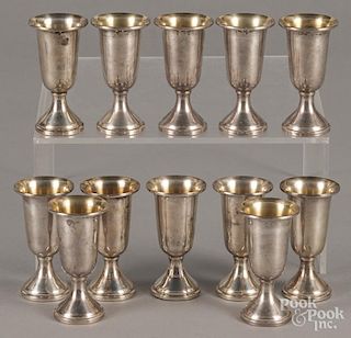 Set of twelve weighted sterling silver cordials, 3 1/8'' h.