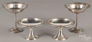 Two pairs of sterling silver compotes, 6 1/4'' h. and 4'' h., 20.8 ozt.