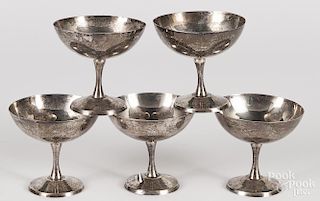 Five sterling silver footed bowls, 4 1/8'' h., 4 1/2'' w., 27.5 ozt.