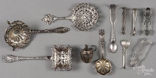 Silver tea items, to include a Webster teapot-form infuser and four strainer spoons