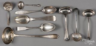 Assorted silver serving spoons and ladles, 15.65 ozt.
