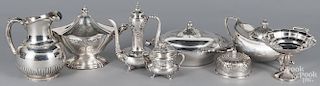Group of silver plated serving pieces.