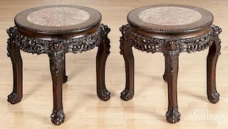 Pair of Chinese carved hardwood marble top stands, early 20th c., 18 1/2'' h., 17 1/2'' w.