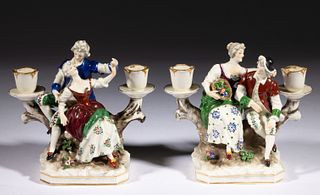CONTINENTAL PORCELAIN FIGURAL GROUP PAIR OF CANDLE HOLDERS, 