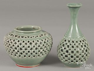 Two Korean reticulated basket weave vases, 20th c., with celadon glaze, 9 1/4'' h. and 5 3/4'' h.