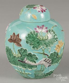 Chinese porcelain ginger jar, 20th c., with lotus and crane decoration on a turquoise ground, 8'' h.