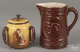 Bennington, Vermont style stoneware pitcher with brown glaze and eagle and rope decoration