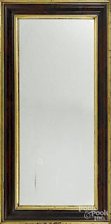 Empire mahogany and giltwood mirror, mid 19th c., 57'' x 28 1/2''.