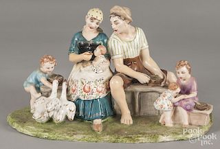 Italian hand painted porcelain figural group of a family, signed Ganci (Italie, 10 1/2'' h., 18'' l.