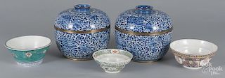 Pair of Chinese blue and white porcelain covered jars, 20th c., 9 1/4'' h., together with three bowls