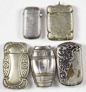 Five nickel silver match vesta safes, one of barrel form, one with engraved bird decoration, etc.