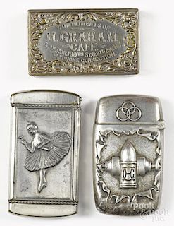 Three nickel silver advertising match vesta safes, one inscribed Krupp, with an embossed logo