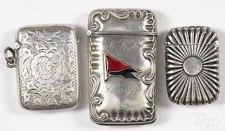 Three sterling silver match vesta safes, to include one inscribed Class of '97
